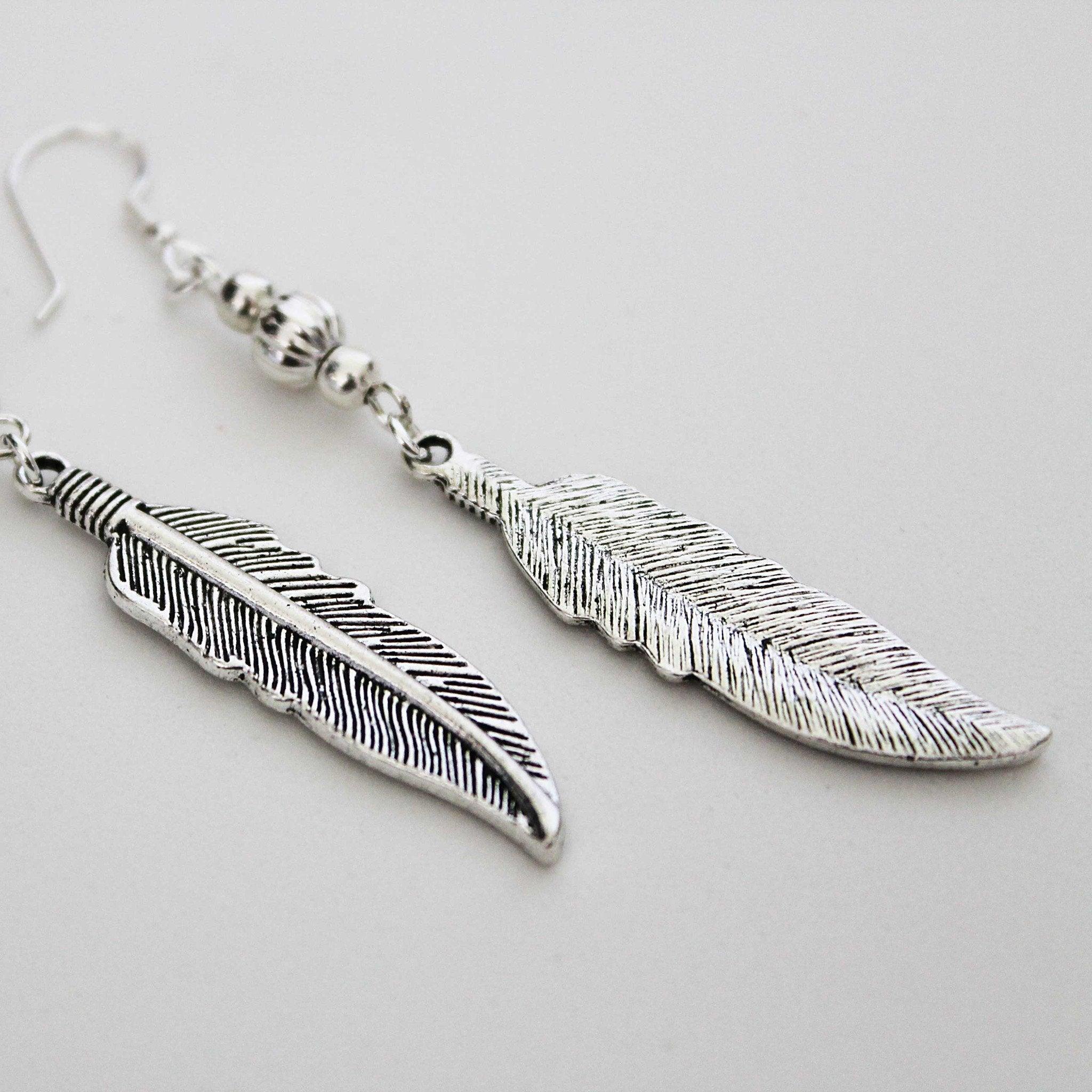 Feather deals dangle earrings